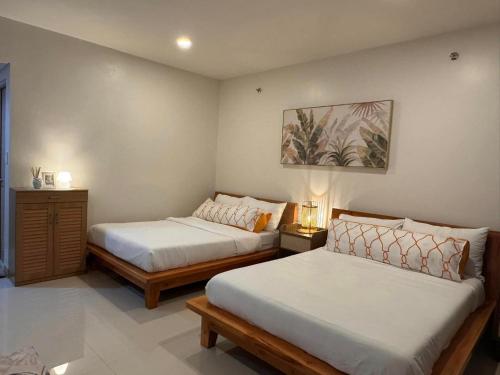 Katil atau katil-katil dalam bilik di Style 823 Condo - Style Residences SM City Iloilo