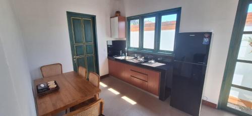 Η κουζίνα ή μικρή κουζίνα στο Vila nymphaea
