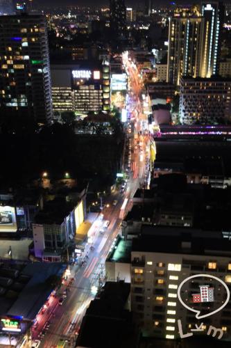 a busy city street at night with cars at The Central Pattaya High Floor, Pattaya City in Pattaya Central