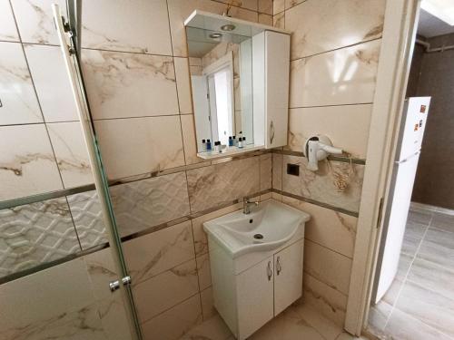 Ένα μπάνιο στο Aslan Suit Otel