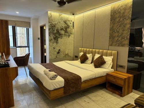 Katil atau katil-katil dalam bilik di Aster Guest House