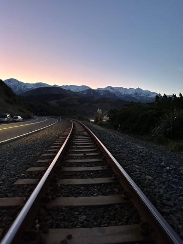 a train track on the side of a road at Oceanview Suite in Hapuku
