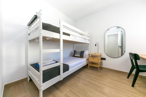 Ένα ή περισσότερα κρεβάτια σε δωμάτιο στο Moderno apartamento en el centro de Fuengirola