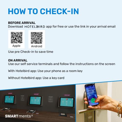 a hand holding a cell phone in front of an atm machine at smartments Berlin City West in Berlin