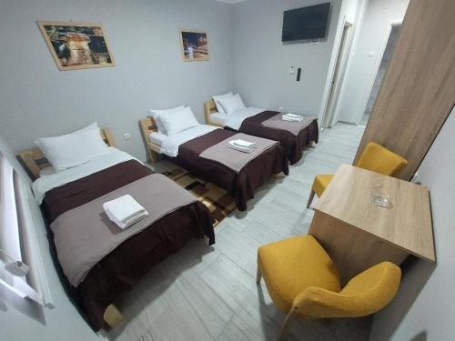Ein Bett oder Betten in einem Zimmer der Unterkunft Smestaj & Spa Protić
