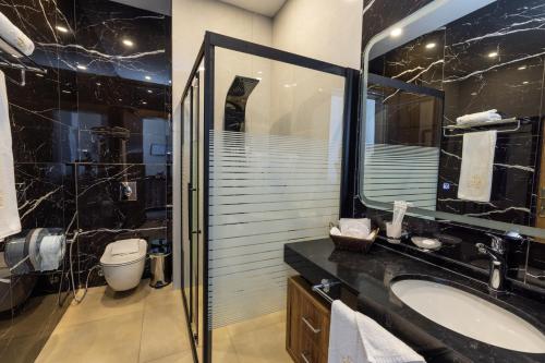 Koupelna v ubytování Jeddah Homes Boutique Hotel