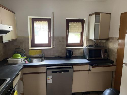 Η κουζίνα ή μικρή κουζίνα στο Gemütliche Apartments mit Balkon