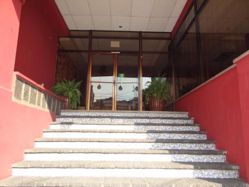 a set of stairs in front of a building at Hotel Sevilla in Guatemala