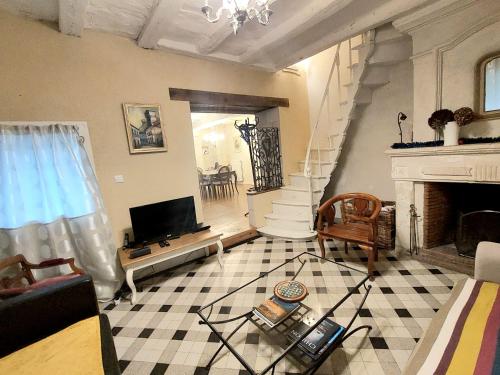 Posezení v ubytování Maison avec terrasse face à la Confluence Loire-Vienne
