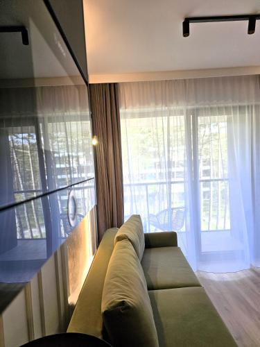Χώρος καθιστικού στο Rogowo Shellter Apartament Premium przy plaży
