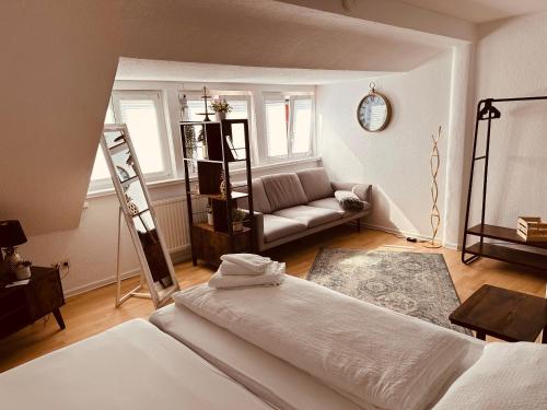 Postel nebo postele na pokoji v ubytování Gemütliche Dachgeschosswohnung
