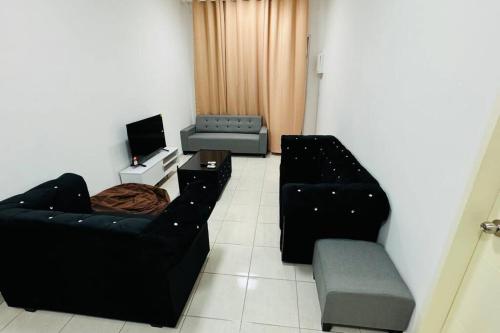 Posezení v ubytování Rest & Go Homestay Tiara Sendayan