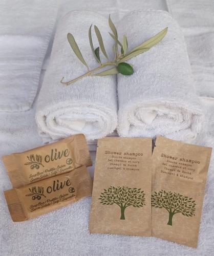 two towels with trees on top of them at Il Poderino di Civitavecchia in Civitavecchia