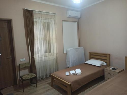 Postel nebo postele na pokoji v ubytování Bal's House