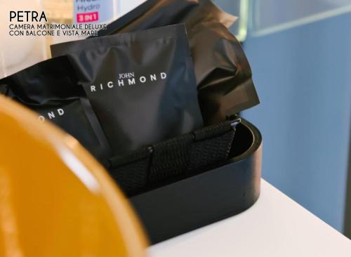 a black bag sitting on top of a counter at Amamare Luxury Room in Giulianova