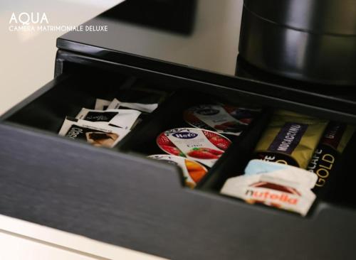 a drawer filled with different types of food at Amamare Luxury Room in Giulianova