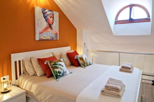 En eller flere senge i et værelse på Orange - Parque Santiago II