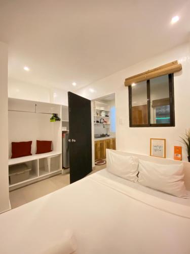 Postel nebo postele na pokoji v ubytování Boracay whitebeach Apartment A10