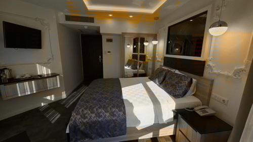 AYDINLI HOTELにあるベッド