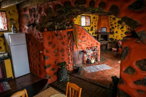 an overhead view of a kitchen with a room with a refrigerator at CHC - Casa Rural del Ciruelo in Buenavista del Norte
