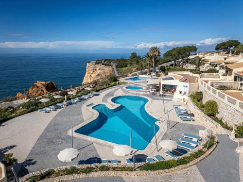 an aerial view of a resort with a swimming pool at Algar Seco Parque in Carvoeiro