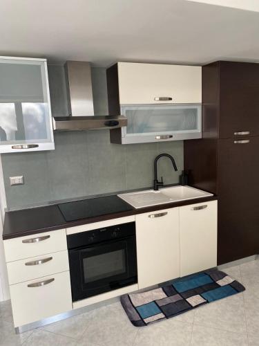 Kuchyň nebo kuchyňský kout v ubytování Lucry s Little house