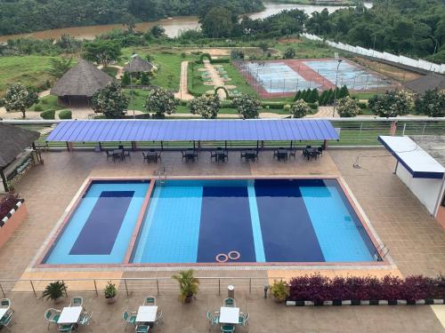 an overhead view of a pool at a resort at Agulu Lake Resort and Conference Centre in Ekwulobia