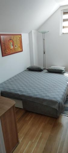 Postel nebo postele na pokoji v ubytování apartman Elena