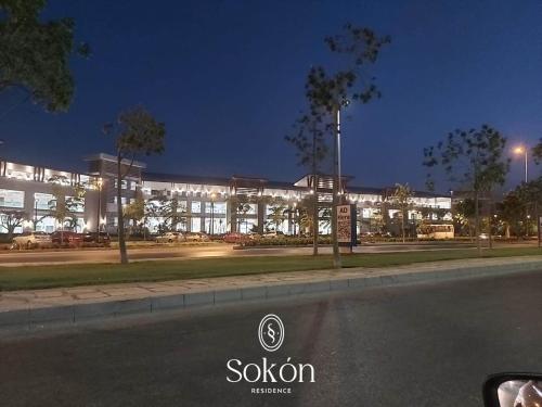 a building lit up at night with lights at Sokón Residence - Cairo-New Cairo-Madinaty B7 in New cairo
