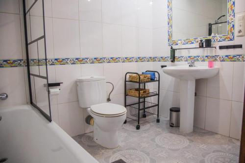 Ein Badezimmer in der Unterkunft Casa Blanca Oliva