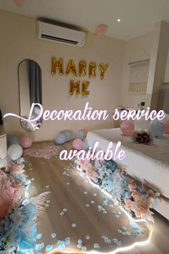 a room with a happy new year sign on the floor at Penang Seaview Apartment up to 11 pax in Bayan Lepas