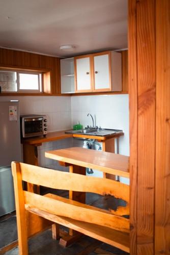 Kuchyň nebo kuchyňský kout v ubytování Hotel Faros del Sur