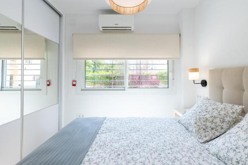 Postel nebo postele na pokoji v ubytování NT Loft Arrayan Amplio Moderno y Renovado 2Bd 2Bth
