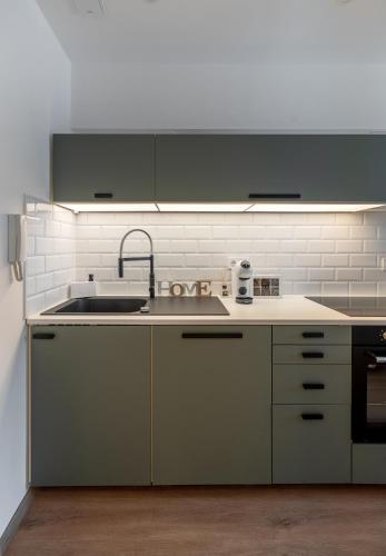 Dapur atau dapur kecil di Geri Modern Home
