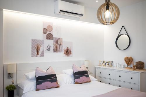 Katil atau katil-katil dalam bilik di Geri Modern Home