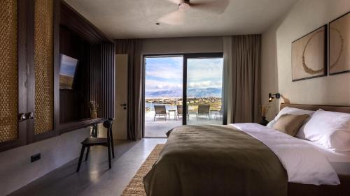 Ένα ή περισσότερα κρεβάτια σε δωμάτιο στο Talaferna Residences - luxury villas