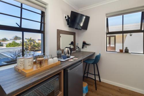 Foto dalla galleria di The Sandcastle Guesthouse - Melkbosstrand a Melkbosstrand