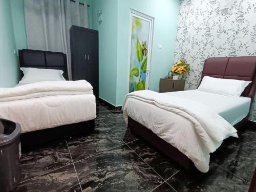 Katil atau katil-katil dalam bilik di SunStar Hotel