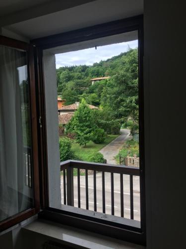 a window with a view of a mountain view at Casa St Uldarico in Brusino