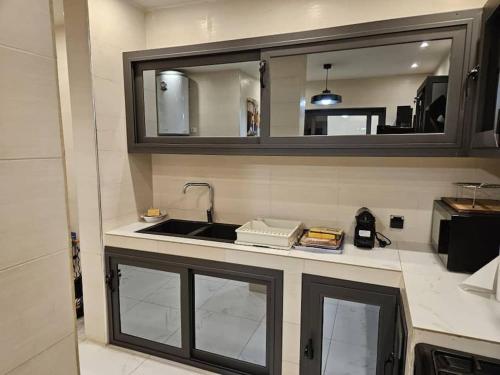 Dapur atau dapur kecil di Appartement Meublé à Keur Gorgui