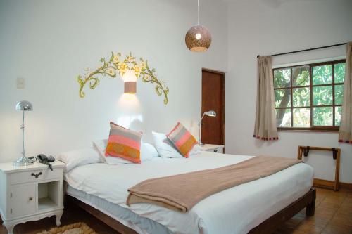 Una cama o camas en una habitación de Andean Wings Valley