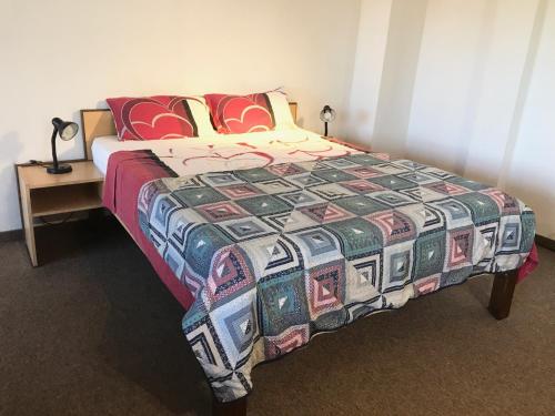 Una cama o camas en una habitación de Casa Loro