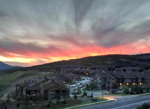 a view of a city with a sunset at Black Rock Ridge 14544 in Kamas