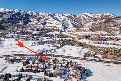 an aerial view of a ski resort in the snow at Park West Village 3953 in Park City