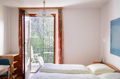 Postel nebo postele na pokoji v ubytování Haus der Achtsamkeit