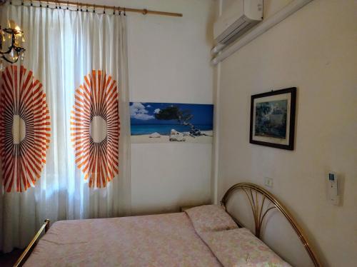 Ένα ή περισσότερα κρεβάτια σε δωμάτιο στο CHEZ L'HOMME TRANQUILLE
