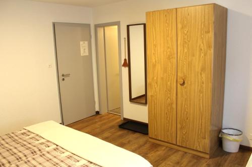 Postel nebo postele na pokoji v ubytování Bonne Auberge Les Bugnenets