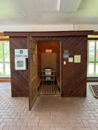 an inside of a wooden building with a door at Rodeway Inn Festival in Stratford