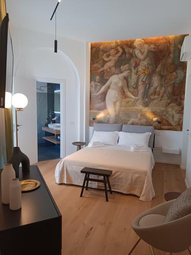 Ένα ή περισσότερα κρεβάτια σε δωμάτιο στο MIRO' Rooms