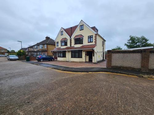 a house on the side of a street at Shortwood Stay in Staines upon Thames